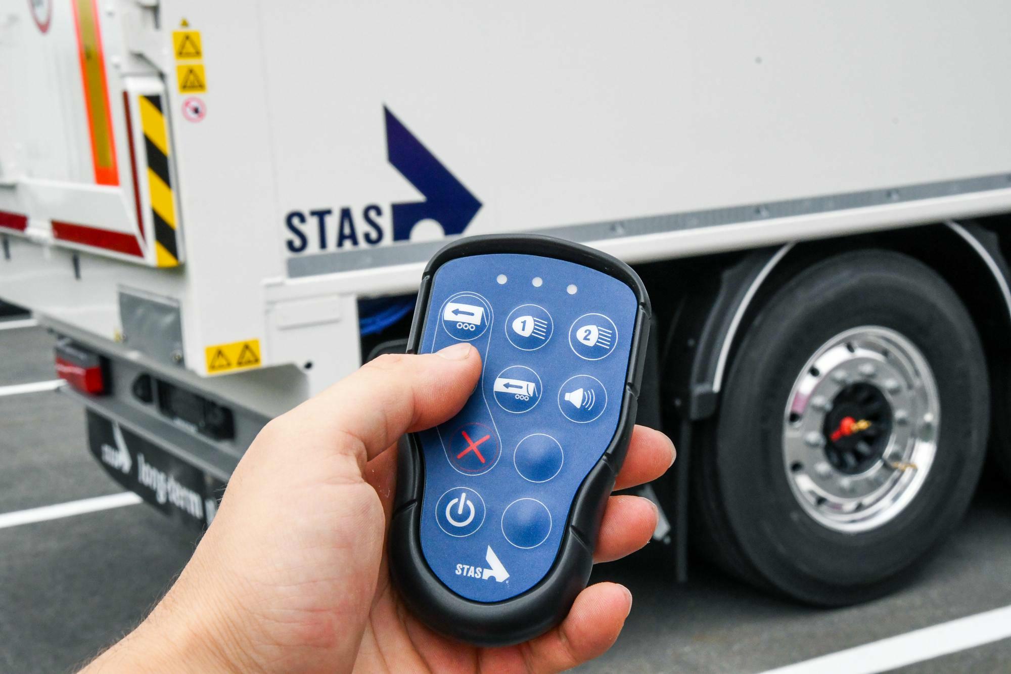 Remote control for walking floor trailers