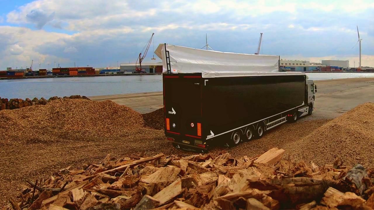 Single versus double-winged hydraulic sheeting system: what’s the right choice for your trailer in waste transport?