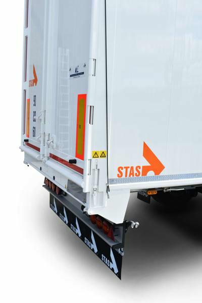 Turnable upper beam with ground operation for moving floor trailers